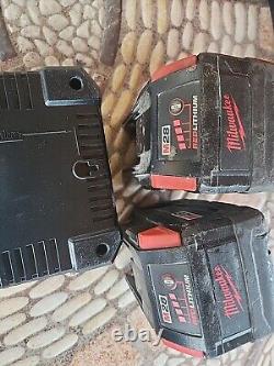 2 Milwaukee 48-11-2830 M28 28 Volt Battery & One Charger 48-59-2819