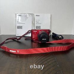 Appareil photo numérique Nikon 1 J1 ROUGE- Chargeur de batterie et manuels d'utilisation avec sangle- Testé
