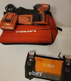 Grand lot d'outils ? Chargeur Hilti, batterie et grand sac à outils Hilti utilisé